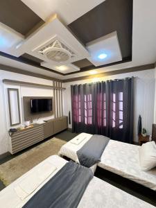 Una cama o camas en una habitación de Signature Skardu Hotel