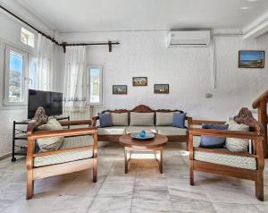 Posezení v ubytování Tinoshomelidays Residences
