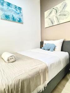 a bedroom with a bed with a stuffed animal on it at Single Room in Pymble Sleeps 1 in Pymble