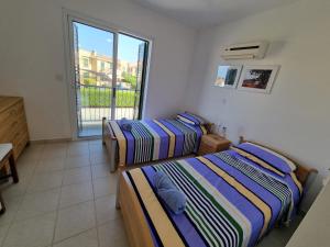 Postel nebo postele na pokoji v ubytování Cyprus 2 beds ensuite pool patio wifi parking + 26 fotografií
