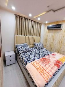 501-NEXT INN Cozy apartment for your stay.. tesisinde bir odada yatak veya yataklar