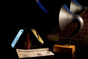 a lamp sitting on a table next to a book at Hotel Gotham in Manchester