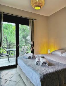 Ένα ή περισσότερα κρεβάτια σε δωμάτιο στο Zennova #21 Dream Nest Home