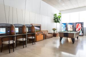 TV a/nebo společenská místnost v ubytování Hotel Izán Cavanna
