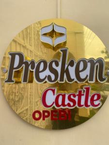a sign for a frozen castle operation on a wall at PRESKEN CASTLE in Lagos