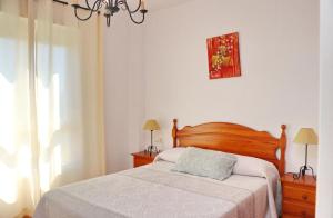 Posteľ alebo postele v izbe v ubytovaní Apartamento vistas al parque