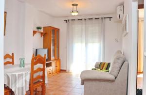 Televízia a/alebo spoločenská miestnosť v ubytovaní Apartamento vistas al parque