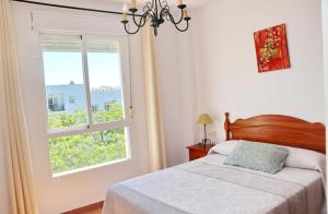 Posteľ alebo postele v izbe v ubytovaní Apartamento vistas al parque