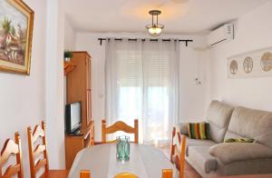 Posedenie v ubytovaní Apartamento vistas al parque