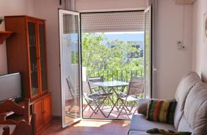 Posedenie v ubytovaní Apartamento vistas al parque