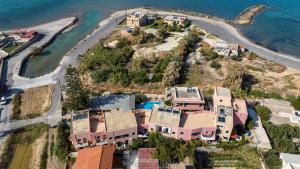 an aerial view of a house next to the ocean at Kri-Kri Village Holiday Apts by Estia in Kokkini Khanion