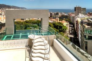 a view from the balcony of a building at INNSiDE by Meliá Tenerife Santa Cruz in Santa Cruz de Tenerife