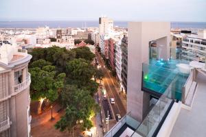 a view of a city from a building at INNSiDE by Meliá Tenerife Santa Cruz in Santa Cruz de Tenerife