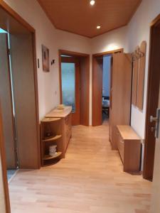 a bathroom with a sink and a mirror at Ferienwohnung Adler in Auerbach