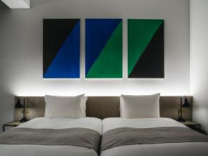 SHIROIYA HOTEL客房内的一张或多张床位