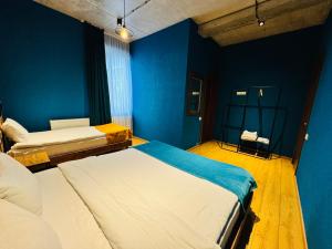 Llit o llits en una habitació de Hotel Misty Mountain