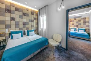 Postel nebo postele na pokoji v ubytování Hotel President