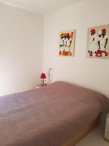 Posteľ alebo postele v izbe v ubytovaní Apartment Vinaroz with swimming pools for 4 people