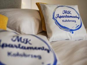 Posteľ alebo postele v izbe v ubytovaní MK Apartamenty Morski