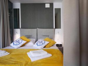 Posteľ alebo postele v izbe v ubytovaní MK Apartamenty Morski