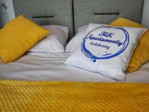 Posteľ alebo postele v izbe v ubytovaní MK Apartamenty Morski