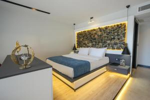 Кровать или кровати в номере Ramitos Hotel