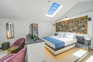 Кровать или кровати в номере Ramitos Hotel