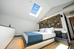 Кровать или кровати в номере Ramitos Hotel