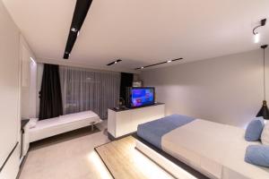Кровать или кровати в номере Ramitos Hotel