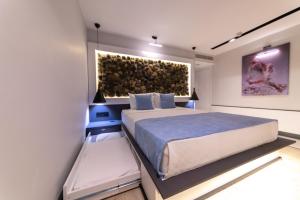 Кровать или кровати в номере Ramitos Hotel