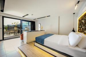 Кровать или кровати в номере Ramitos Hotel