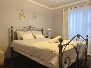 Katil atau katil-katil dalam bilik di Fonton Blue Holiday Home close to City and Airport