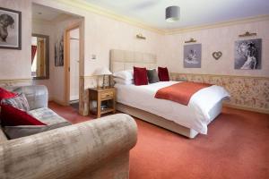 מיטה או מיטות בחדר ב-Dryburgh Farmhouse