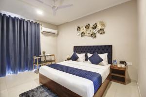 Postel nebo postele na pokoji v ubytování Limewood Stay - Executive Huda City Center + 37 fotografií