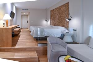 Postel nebo postele na pokoji v ubytování Olympion Asty Hotel + 37 fotografií