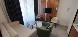 TV a/nebo společenská místnost v ubytování Apartmani Jovanovic - Rafailovici