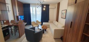 TV a/nebo společenská místnost v ubytování Apartmani Jovanovic - Rafailovici