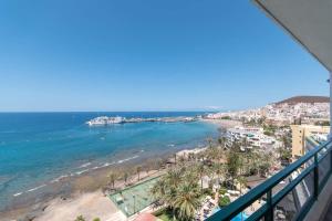 a view of the beach from a balcony at Comodoro 6 - One Bed in Los Cristianos