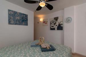 Voodi või voodid majutusasutuse Borinquen 1 - Studio with amazing sea and pool views toas