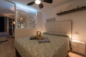 Voodi või voodid majutusasutuse Borinquen 1 - Studio with amazing sea and pool views toas