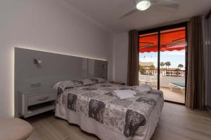 Postel nebo postele na pokoji v ubytování Park Santiago II 85 - Two Bed + 37 fotografií