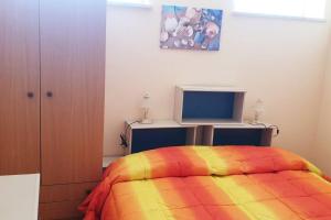A bed or beds in a room at Borgo San Giorgio Apartment