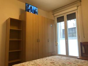 En TV eller et underholdningssystem på Apartamento San Gregorio