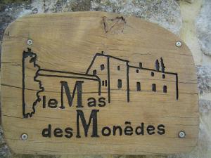 Ein Schild, auf dem "mexico des mondlords" steht. in der Unterkunft Le Mas des Monèdes in Saint-Paul-le-Jeune