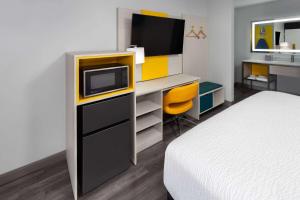 Postel nebo postele na pokoji v ubytování Days-Inn by Wyndham Baltimore Northwest