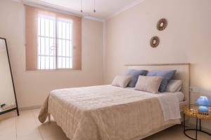 Posteľ alebo postele v izbe v ubytovaní Apartamento La Piconera Centro Cordoba