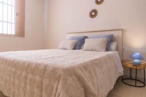 Posteľ alebo postele v izbe v ubytovaní Apartamento La Piconera Centro Cordoba