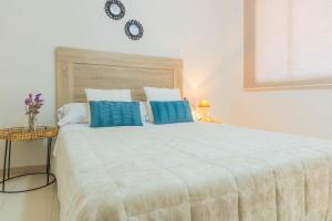 Posteľ alebo postele v izbe v ubytovaní Apartamento La Piconera Centro Cordoba