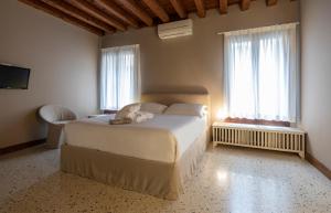 Ένα ή περισσότερα κρεβάτια σε δωμάτιο στο Maison De Gabriela