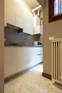 Η κουζίνα ή μικρή κουζίνα στο Maison De Gabriela